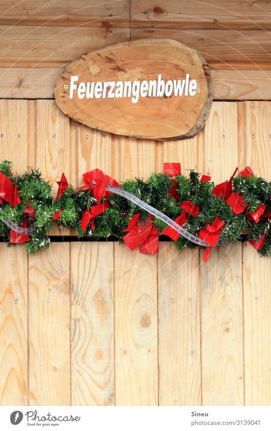 Christmas market Mulled wine Feuerzangenbowle Shopping Christmas & Advent Christmas Fair Hut Christmas wreath Wood Drinking Kitsch Brown Green Red Gluttony