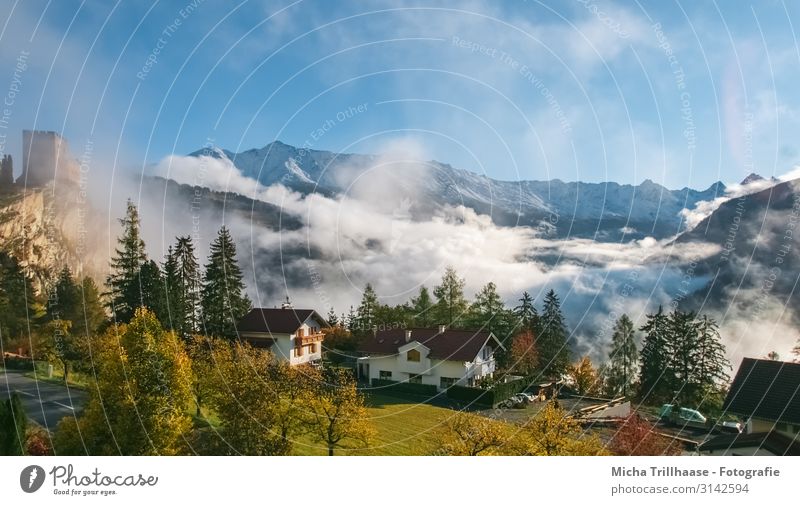 Mist in the mountains Vacation & Travel Tourism Mountain Hiking Nature Landscape Sky Clouds Autumn Beautiful weather Fog Tree Alps Peak Ladis Austria Village