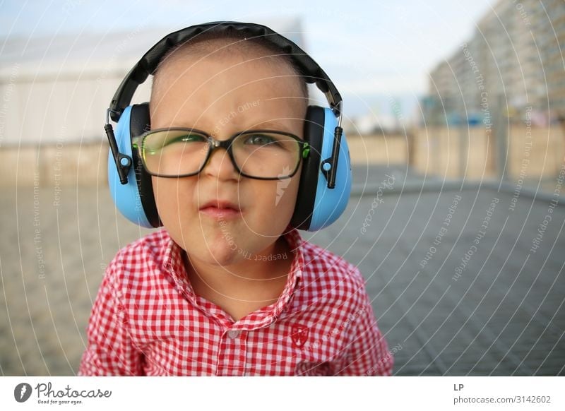 cute kid wearing headphones and glasses and making faces Lifestyle Human being Masculine Child Family & Relations Infancy Art Culture Youth culture Subculture