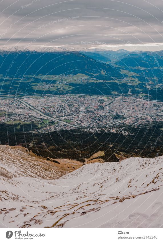 Nordkette / Innsbruck Sightseeing Nature Landscape Storm clouds Autumn Snow Alps Mountain Peak Town Gigantic Infinity Natural Colour Sustainability Perspective