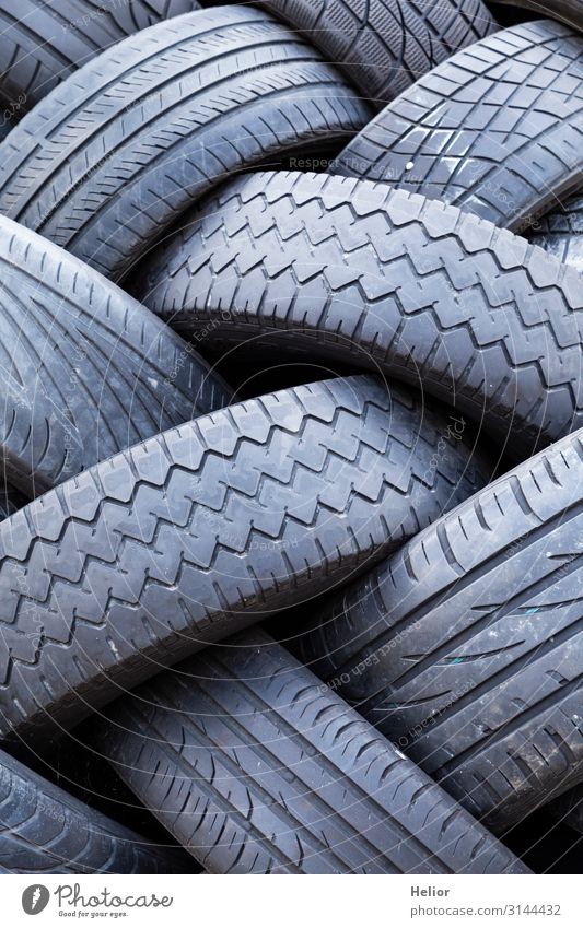 Stacks of old worn car tires Environment Transport Road traffic Motoring Car Lie Old Environmental pollution Environmental protection Archaic Tire tread