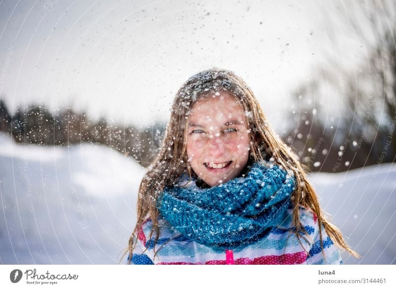 happy girl in the snow Joy luck Contentment Leisure and hobbies Vacation & Travel Winter Snow Child Landscape Weather Snowfall peel Laughter Happiness chill