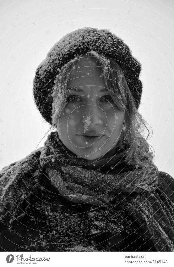Snowwoman Woman Adults 1 Human being Winter Snowfall Scarf Cap Smiling Stand Happiness Cold Wet Emotions Moody Joy Climate Nature Environment
