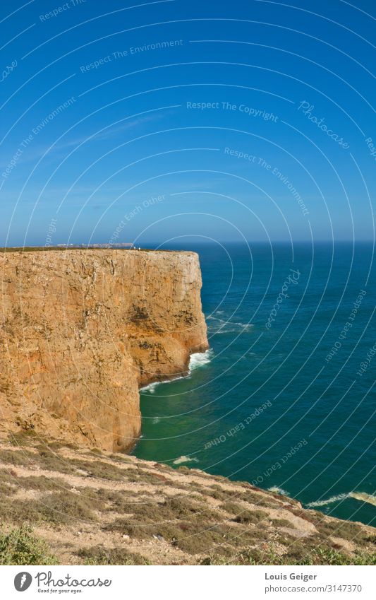 Sagres Coast Far-off places Freedom Summer Sun Ocean Waves Nature Landscape Water Sky Horizon Beautiful weather Warmth Drought Bushes Hill Rock Bay Stone