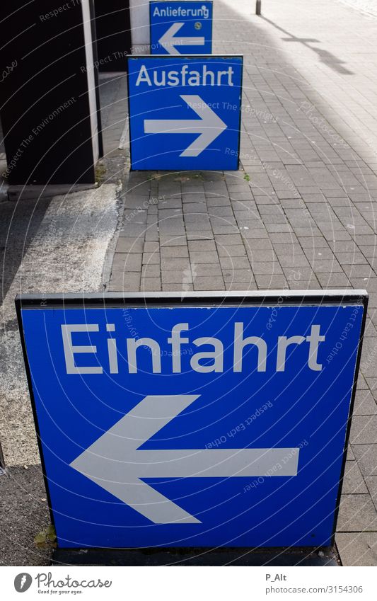 In-Out Münster Germany Town Parking garage Parking lot Highway ramp (entrance) Signs and labeling Highway ramp (exit) Delivery Transport Road traffic Motoring