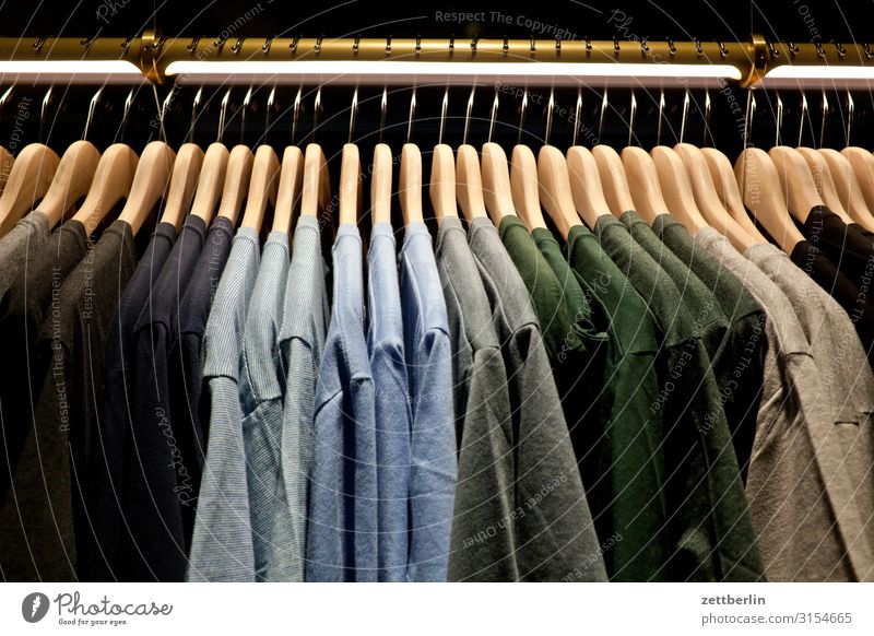 T-shirts Attract Selection Cotton Clothing Colour Color chart Play of colours Shopping Off-the-rack Store premises Deserted Summer clothing Shop window