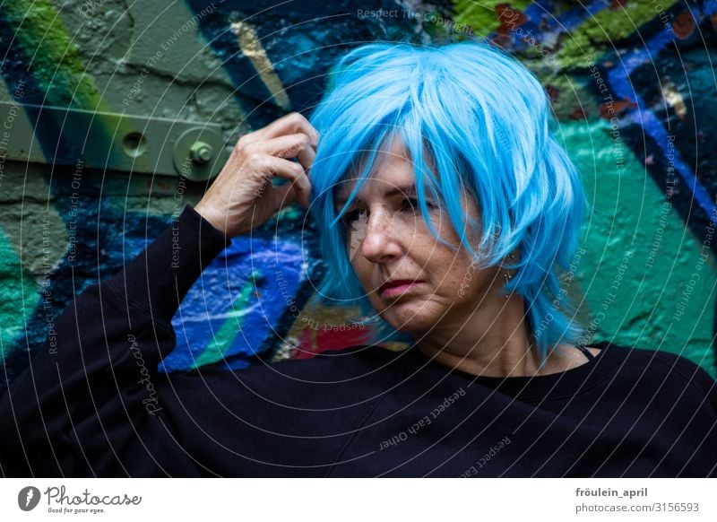 Feeling blue | UT HH 2019 Exterior shot Side view Woman graffiti Hamburg Wall (barrier) Wig Landscape format fun daylight Blue variegated Think Black Sit Dream