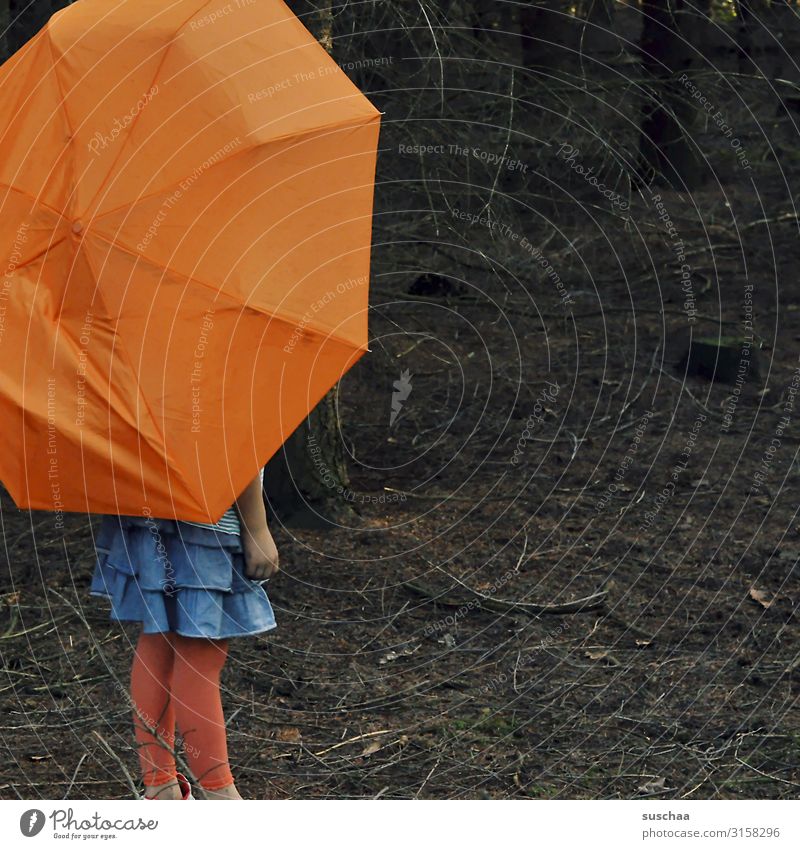 with umbrella in the forest Child Girl Umbrellas & Shades Undergrowth Forest Tree Branch Woodground Dark Loneliness Individual Multicoloured Orange Skirt Rain