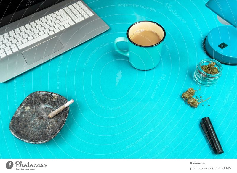 Blue work space with marijuana joint, coffee cup and computer. Candy Breakfast Organic produce Coffee Lifestyle Design Smoking Intoxicant Wellness Relaxation