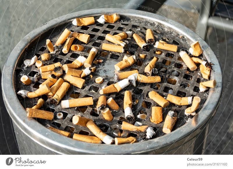 Cigar butts Lifestyle Smoking Trashy cigarrettes cigarette butt tip Ashtray Expressed Unhealthy Addiction smoking break Filter-tipped cigarette Colour photo