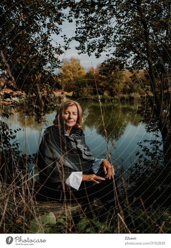 autumn portrait Lifestyle Woman Adults Female senior 45 - 60 years 60 years and older Senior citizen Nature Landscape Autumn Beautiful weather Bushes Forest