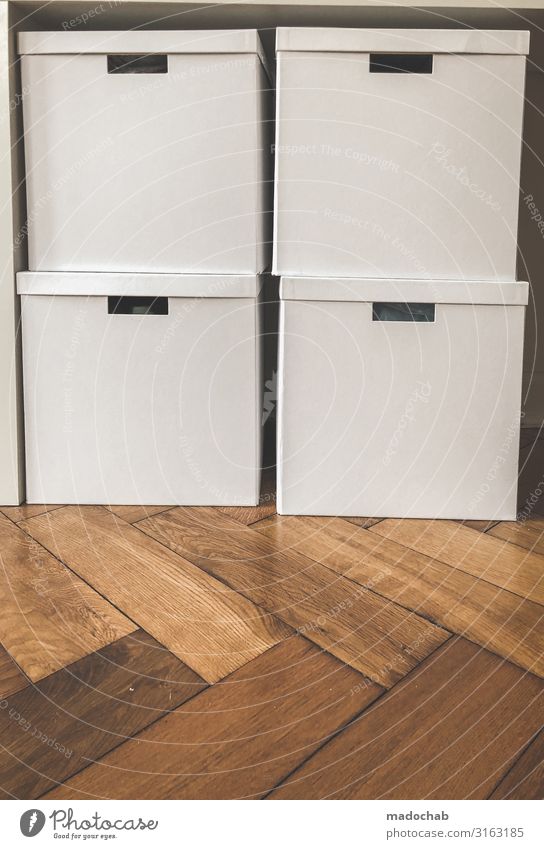 Packed - stacked cartons Storage Order Lifestyle Living or residing Flat (apartment) Interior design Clean White Protection Attentive Disciplined Orderliness