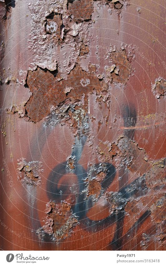 Metal surface with rust spots and graffiti Graffiti Container Surface Rust Old Trashy Brown Red Town Decline Transience Colour photo Exterior shot Deserted