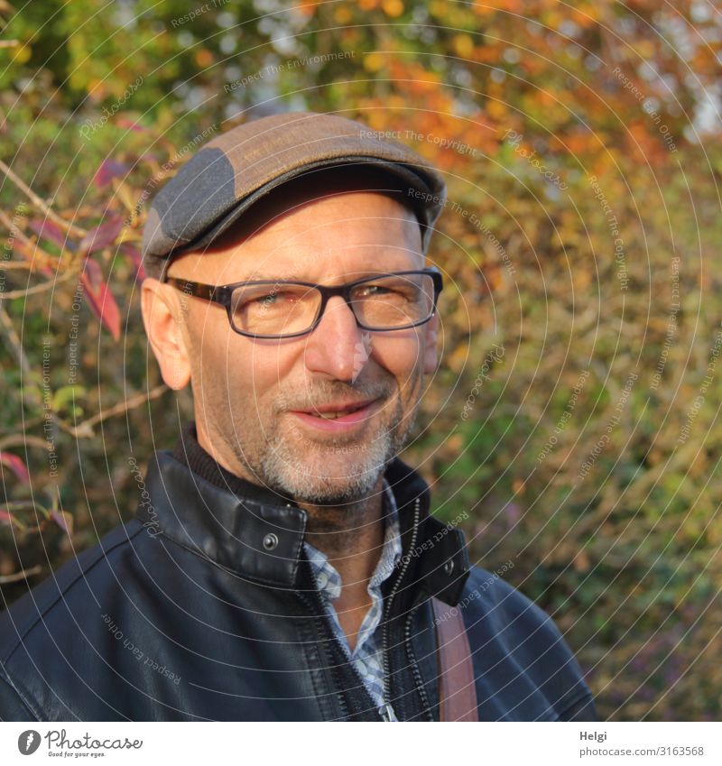 Portrait of a friendly smiling man with beard, glasses and cap Human being Masculine Man Adults Male senior Senior citizen 1 45 - 60 years Environment Nature