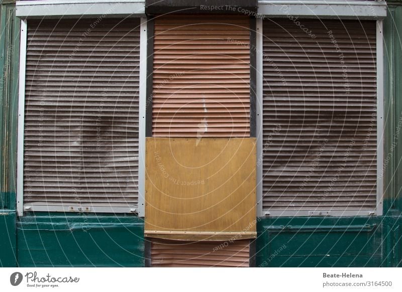 Shut down: business premises closed by shutters and wooden crate shank Store premises Closed broke business discontinuation Retail sector Economy Shop window