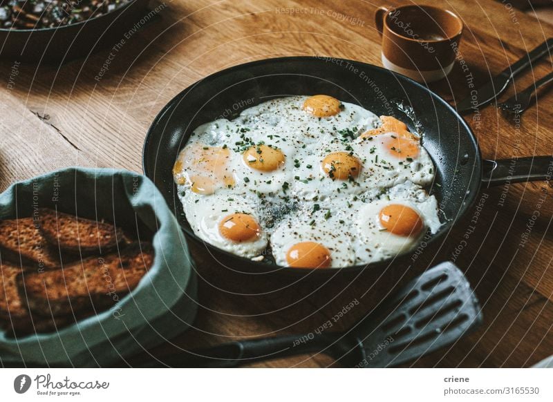 Pan with fried eggs and bread for breakfast Food Healthy Eating Dish Food photograph Meal Egg Cooking Frying Breakfast Vegetable Close-up Hot Kitchen Lunch