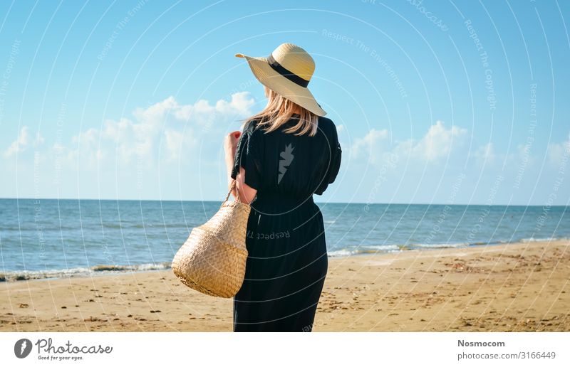 Women with black dress and straw hat relaxing at beach Lifestyle Beautiful Body Wellness Harmonious Relaxation Meditation Vacation & Travel Summer Sun Beach