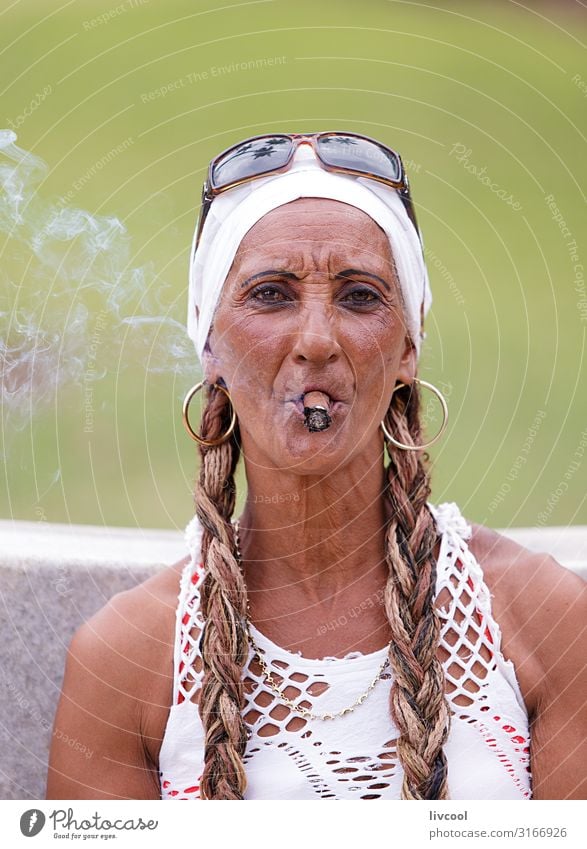 3166926 Cuban Woman Smoking A Cigar In A Park In Havana Cuba Photocase Stock Photo Large 