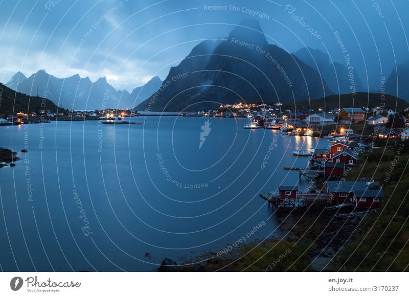 The rain is coming Vacation & Travel City trip Nature Landscape Storm clouds Night sky Bad weather Rain Mountain Fjord Reine Norway Scandinavia Lofotes Village