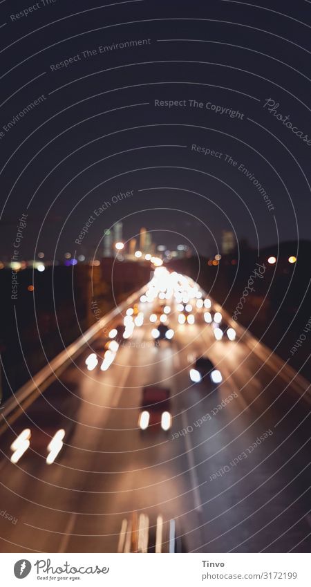 Blurred image of big city highway at rush hour Capital city Transport Traffic infrastructure Road traffic Motoring Highway Car Stress Haste Rush hour Floodlight