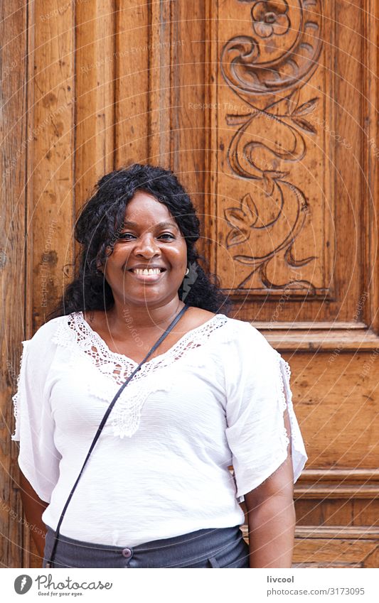 cuban woman in front of carved wooden door Lifestyle Style Happy Beautiful Vacation & Travel Trip Island Human being Feminine Woman Adults Body Head