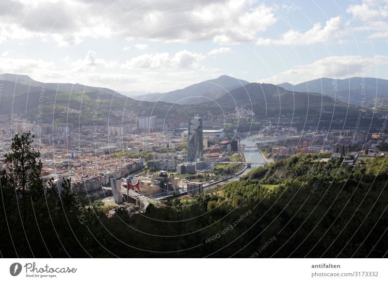 In the far distance Bilbao Town Guggenheim Museum Exterior shot Architecture Sky Deserted Day Downtown Tourism Mountain Vacation & Travel City trip Europe