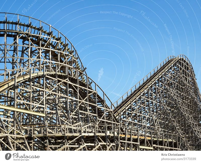 Wooden roller coaster Summer Summer vacation Blue Brown Joy Roller coaster Theme-park rides Amusement Park Happiness Ride Thrill Colour photo Day Sunlight