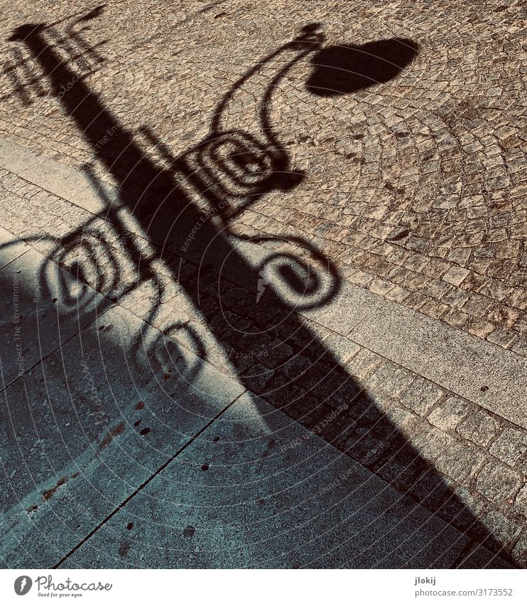 shadow Town Old town Deserted Street lighting Shadow Paving stone Electricity Light Energy energy revolution Subdued colour Exterior shot Day