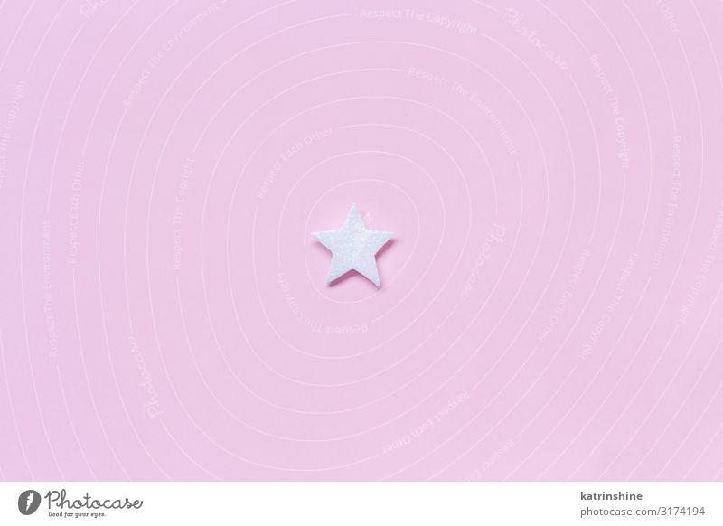 White Christmas star on a light pink background Decoration Ornament Pink pastel Guest Festive holidays seasonal noel Copy Space Minimal Conceptual design
