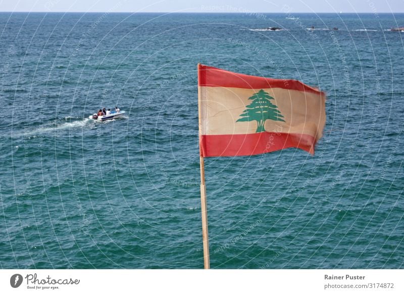 Lebanese flag on the coast of Beirut Cloudless sky Sun Summer Coast Ocean Mediterranean sea Lebanon Blue Green Red Turquoise White Horizon Flag Ensign