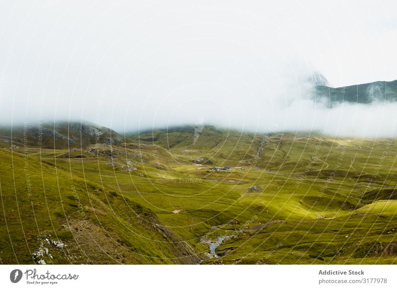 Fog over beautiful hilly terrain Hill Nature Landscape Vacation & Travel Trip Green Rough Tourism Environment Weather Fat Mountain Dune Range Deserted