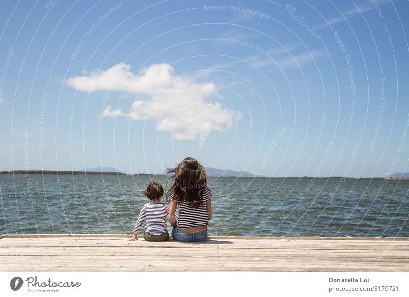 Brother and sister on pier Vacation & Travel Freedom Summer Ocean Waves Child Human being Masculine Feminine Woman Adults Sister Couple Infancy 2 1 - 3 years