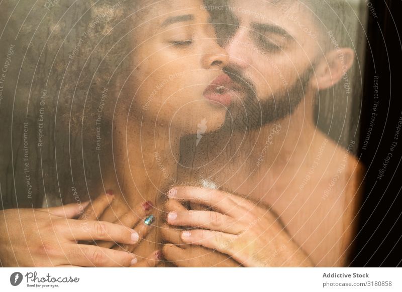 Bearded man touching girlfriend behind window Couple Passion Touch Window Kissing Eroticism Closed eyes Alluring Man Woman Desire Relationship Love To enjoy