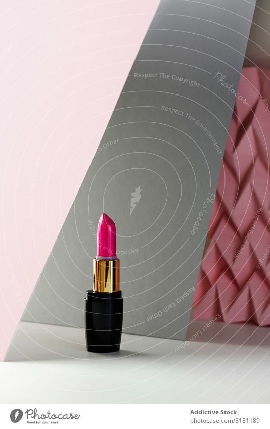 Lipstick on raised pink chevron. Product and make up concept Make-up Cosmetics Beauty Photography Background picture Pink Deserted Fashion Still Life Stick