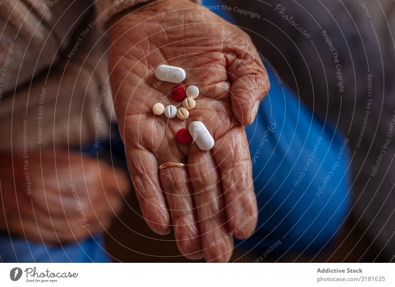 Detail of pills on the hand of an old man Hand Old Considerate Senior citizen Pill Man Human being Year date Caucasian Hold Intoxicant Adults Healthy Medication