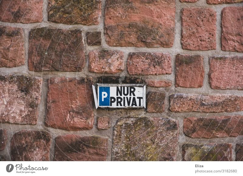 Private only Wall (barrier) Bans Clearway private parking Parking Brick wall Rule Parking lot Signs and labeling Transport Subdued colour Exterior shot
