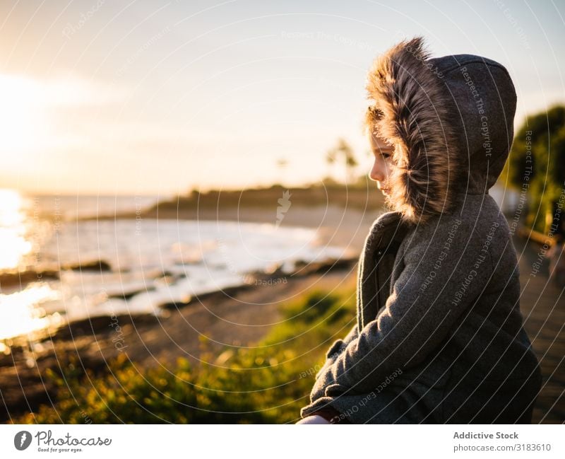 pensive girl at beach on winter Girl Child Pensive Winter Beach Ocean exploration Spring Day Nature Vacation & Travel Cold Small Autumn Human being Water