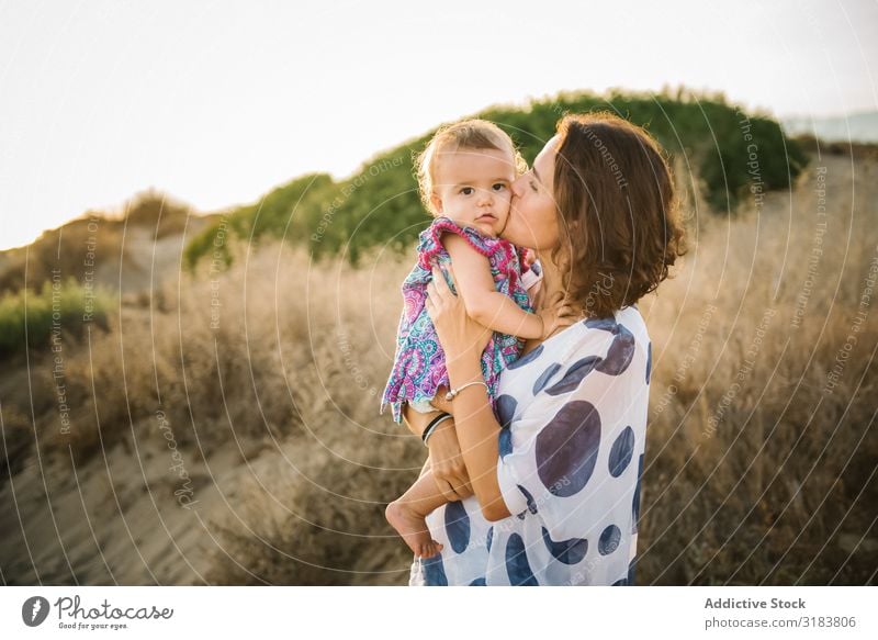 Mother holding child Woman Child Hold Son Beach seaside Sand Vacation & Travel Ocean Summer Water Together Coast Nature Landscape Tourism Beautiful