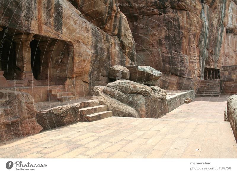 Rock Temples Vacation & Travel Tourism Building Architecture Monument Stone Gigantic Brown Red Cave place of worship rock-cut figures Statue Column construction