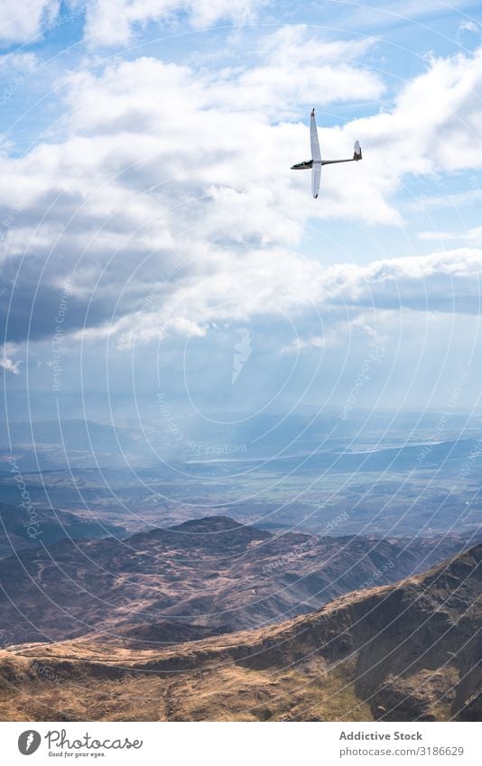 Small Aircraft Flying Over Mountains A Royalty Free Stock Photo From Photocase
