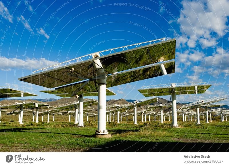 Solar panels on power station Solar Power Panels Station Sky Beautiful weather Reflection Glittering Sunbeam Day Energy Electricity Technology Weather