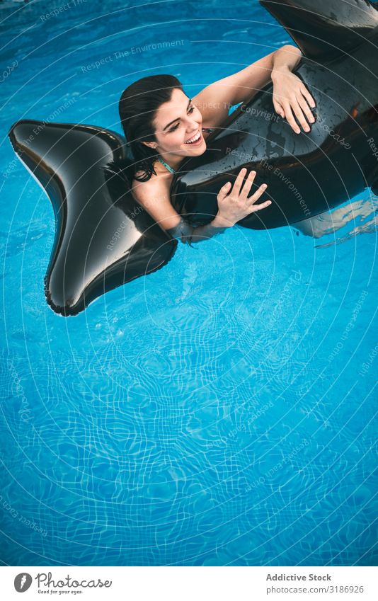 Girl with inflatable toy posing in water Posture Swimming pool Joy riding Inflatable Fish Toys Ride Water Happy Smiling pretty Beauty Photography Laughter