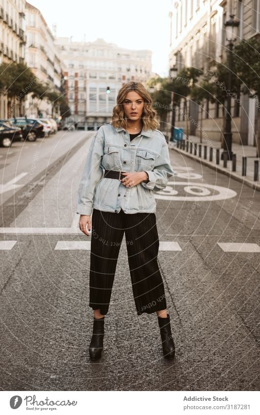 Stylish woman in middle of city road Woman Style Street City Stand Youth (Young adults) Model outfit Town Fashion Hip & trendy Easygoing Asphalt To enjoy