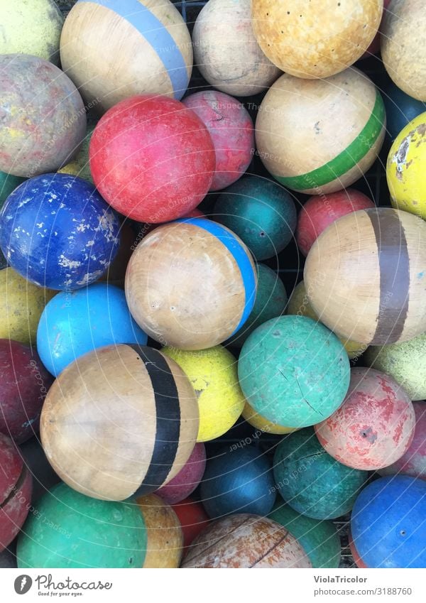 Collection of colorful, colored balls made of wood, with patina, detail view, view from above Leisure and hobbies Sphere Ball Playing Children's game Sports