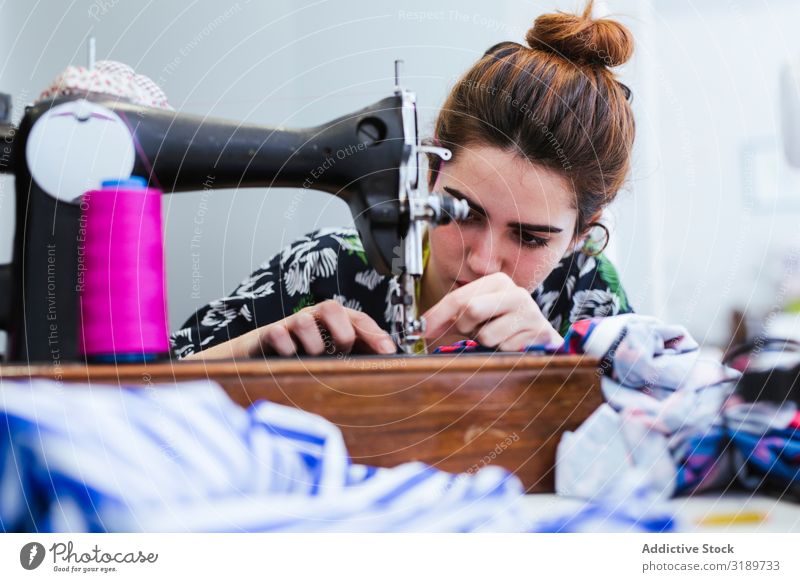 Teenage girl in a sewing school Woman Grade (school level) Classroom Youth (Young adults) Clothing Embroidery Factory Girl Profession machine Pattern School