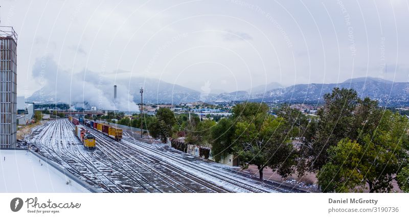 Trains During the Wintertime in a Small Town Landscape Sky Clouds Snow Tree Forest Snowcapped peak Nature Vacation & Travel Colorado Railroad Train station