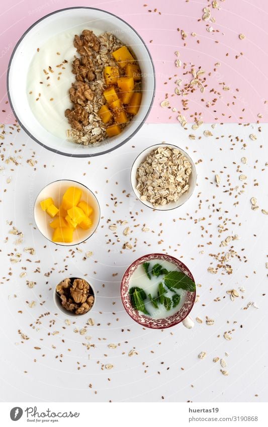 Bowl of homemade granola with yogurt and cereals Food Yoghurt Fruit Nutrition Breakfast Vegetarian diet Diet Spoon Lifestyle Healthy Eating Fresh Delicious