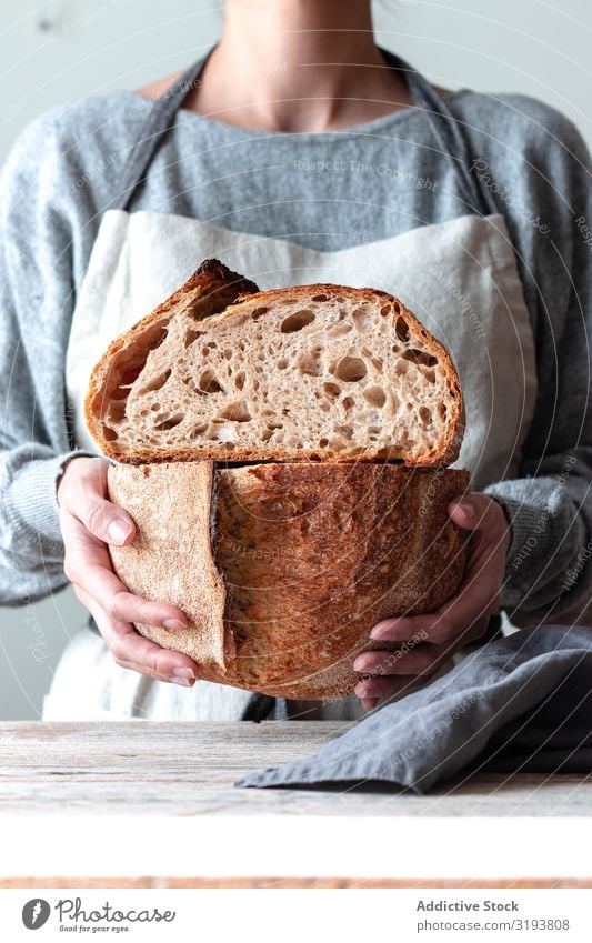 Hands of woman holding bread Woman Bread Food Kitchen Bakery Home-made Fresh Cook Ingredients Flour Wheat Preparation Baked goods Meal Cooking Human being Tasty