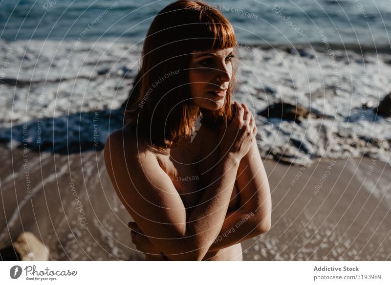 Sensual Woman Posing On Seashore A Royalty Free Stock Photo From Photocase