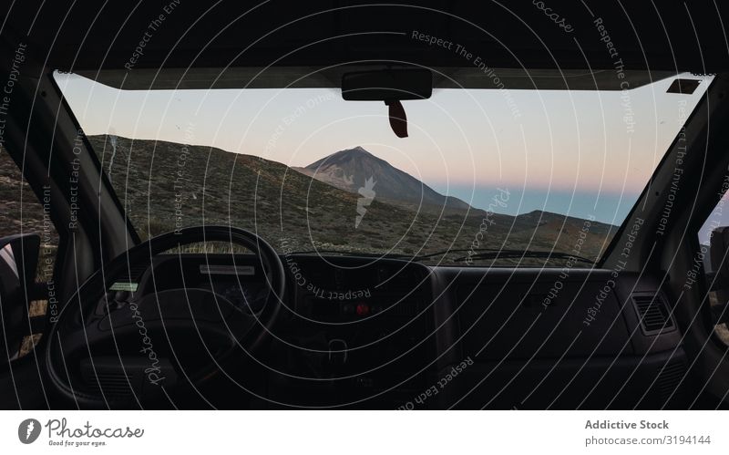 View of mountain through window of car Mountain Desert Car Window Picturesque Peak Tenerife Spain Remote through glass Area Morning road trip Traveling Tourism